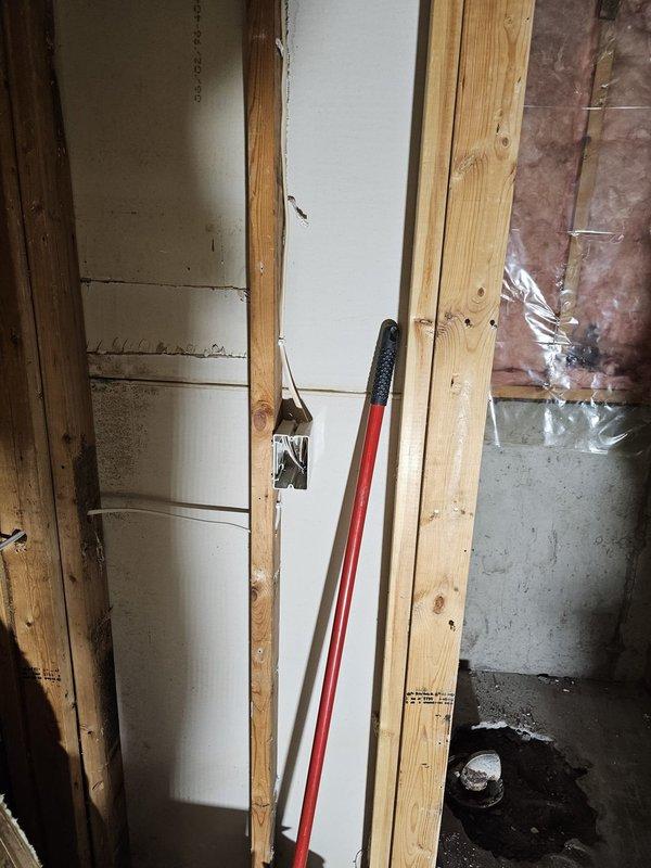 Completed electrical rough-in for basement bathroom renovation including installation of new bathroom exhaust fan wiring, LED wafer light replacement for shower area, and relocation of switches to accommodate new built-in linen cabinet. Upgraded existing outlet to GFCI and installed dedicated 20-amp circuit from the Cutler Hammer CH panel in unfinished basement.