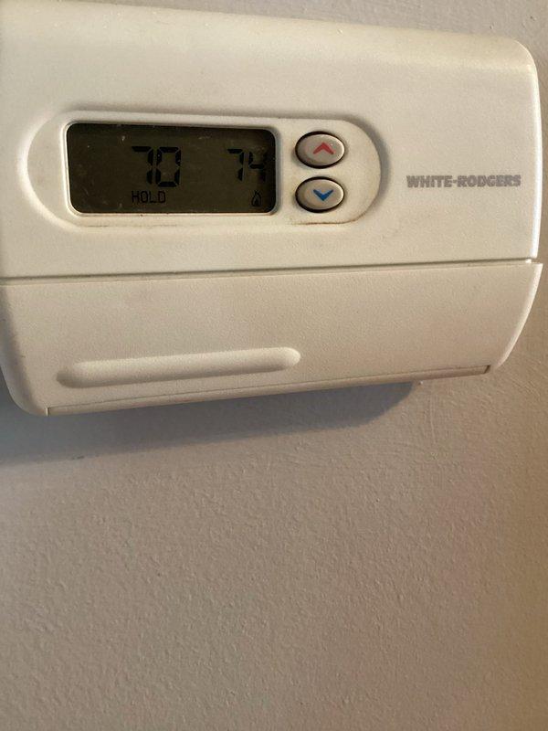 Responded to service call for boiler pressure issues. Diagnosed trapped air in system causing elevated pressure readings (gauge showing above normal 15-18 PSI operating range). Performed complete system purge across all three floors to release trapped air and restore proper pressure levels.