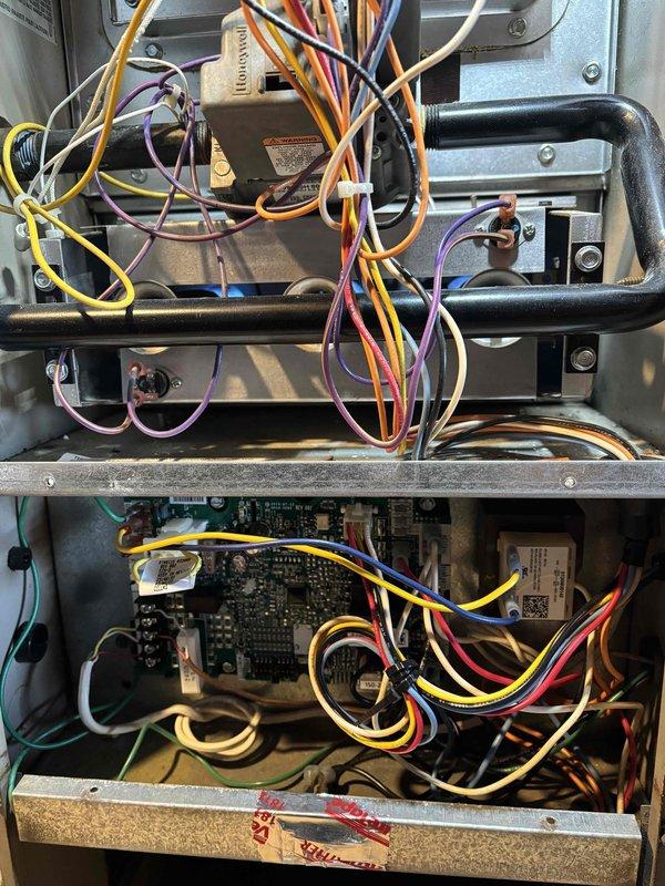 Completed fall tune-up maintenance service on standard furnace system located in attic. Performed comprehensive inspection of internal components including blower motor, fan assembly, circuit boards, and electrical connections. All systems functioning properly with no issues identified.