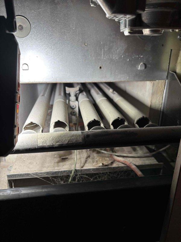 Performed scheduled boiler maintenance and tune-up in response to temperature discrepancy issue. Inspected burner elements which showed dust accumulation and cobwebs requiring cleaning. Checked system pressure/temperature gauges which confirmed customer-reported variance of 6-8 degrees between set point and actual temperature. Calibrated temperature controls to restore proper heating function.