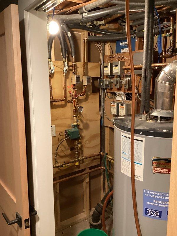 Diagnosed bedroom zone heating issue caused by low water pressure in boiler system. Identified noisy circulation pump and two non-functioning radiators. Restored system functionality by adding water to increase pressure to proper operating level.