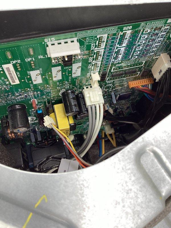 Diagnosed heat failure on Daikin RXM18WVJU9 outdoor unit (serial E001563). Identified defective outdoor fan motor and control board causing no heat condition. Completed successful replacement of both components, restoring proper system operation.