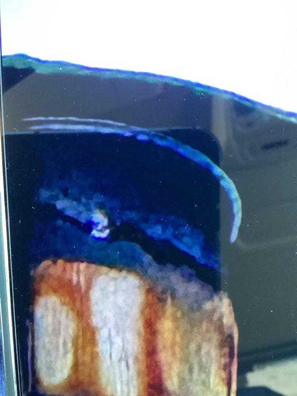 Investigated reported chimney leak where previous furnace/AC installation included capping the chimney. Observed significant corrosion on the metal chimney pipe with visible rust bands. Interior inspection revealed potential exhaust leakage issues. Due to unsafe roof conditions, completed partial assessment and scheduled follow-up visit in approximately 2-3 weeks to complete roof inspection when conditions improve.