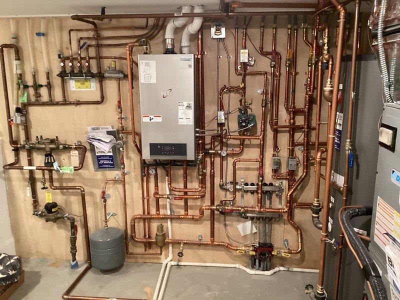 Responded to no-heat call for in-floor heating system in sunroom. Diagnostic testing revealed faulty wiring as the root cause. Completed repair of damaged wire, restoring proper functionality to the heating system. Inspected boiler and associated copper piping network, confirming all components now operating correctly.