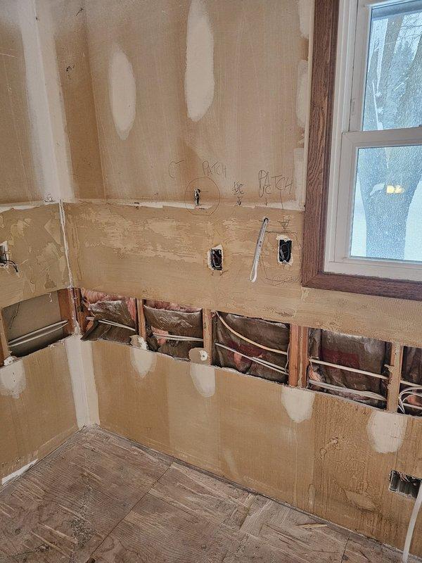 Completed kitchen remodel electrical work including updating existing countertop outlets to tamper-proof receptacles, installing GFI outlets for dishwasher and garbage disposal, and adding AFCI protection to dedicated circuits per code requirements. Installed new electrical connections for range hood, microwave, and kitchen island, along with installation of pendant lights, LED wafer lights, and under-cabinet lighting with appropriate dimmer switches.