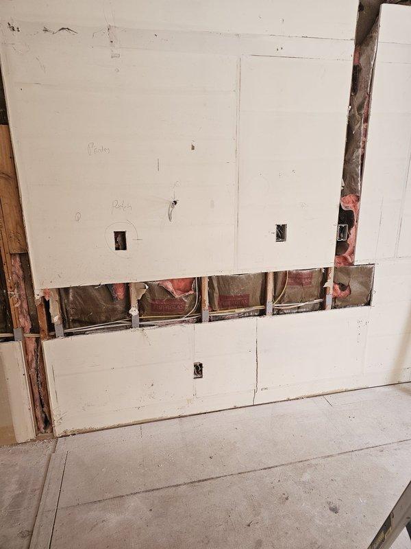 Completed kitchen remodel electrical work including updating existing countertop outlets to tamper-proof receptacles, installing GFI outlets for dishwasher and garbage disposal, and adding AFCI protection to dedicated circuits per code requirements. Installed new electrical connections for range hood, microwave, and kitchen island, along with installation of pendant lights, LED wafer lights, and under-cabinet lighting with appropriate dimmer switches.