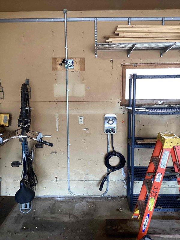 Successfully completed installation of an Xcel-supplied EV charging station in client's garage, including removal of old sub-panel, installation of surface-mounted conduit, and hardwiring of the 40-amp circuit (providing 32-amp output). Programmed and configured the Charge Point app during installation, ensuring proper functionality of the charging system.