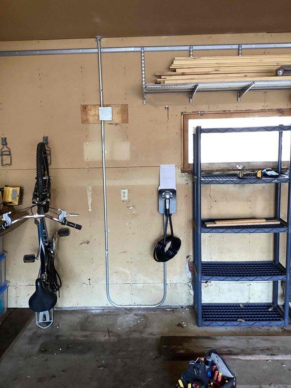 Successfully completed installation of an Xcel-supplied EV charging station in client's garage, including removal of old sub-panel, installation of surface-mounted conduit, and hardwiring of the 40-amp circuit (providing 32-amp output). Programmed and configured the Charge Point app during installation, ensuring proper functionality of the charging system.
