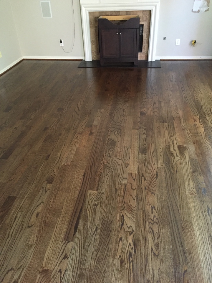 Just finished up a job in Kennesaw we we we sanded the homeowners house came back with the dark stain did stair tread's rod iron spindles home owner very very happy   the floor turned out great finished on time