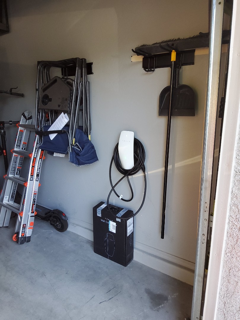 Today, I installed a Tesla charger inside the garage. The process began with a thorough assessment of the electrical system to ensure it could support the charger's power requirements. I then selected an optimal location for the charger, considering factors such as accessibility and safety. After ensuring all necessary permits were in place, I proceeded to mount the charging station securely on the wall. I connected the charger to the home's electrical system, ensuring all wiring was done safely and in compliance with local codes. I tested the charger to confirm it was functioning correctly and provided detailed instructions to the homeowner on its use and maintenance. The installation was completed efficiently, ensuring the homeowner could conveniently charge their Tesla vehicle.