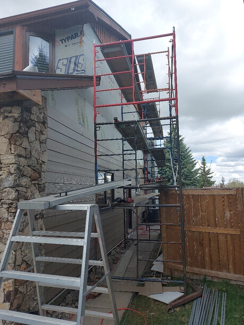 Calgary, AB - Another James Hardie Wrap in SE Calgary, Woodstock Brown Lap Siding, windows trimmed out in Brown Blaze from the Hardie Dream Collection otherwise known as Rich Espresso.
Calgary, AB - Another James Hardie Wrap in SE Calgary, Woodstock Brown Lap Siding, windows trimmed out in Brown Blaze from the Hardie Dream Collection otherwise known as Rich Espresso.
