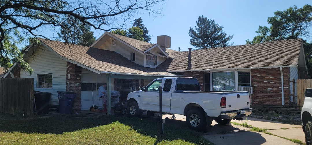 Denver, CO - We are doing a roof inspection for this house in Denver that needs a complete re-roof. The insurance company authorized a full roof replacement as well as new gutters and some house paint. We will work with his insurance company to get a few more items authorized for replacement Denver, CO - We are doing a roof inspection for this house in Denver that needs a complete re-roof. The insurance company authorized a full roof replacement as well as new gutters and some house paint. We will work with his insurance company to get a few more items authorized for replacement