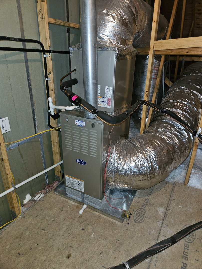 Service call. Performed maintenance on two Carrier gas furnace systems. 