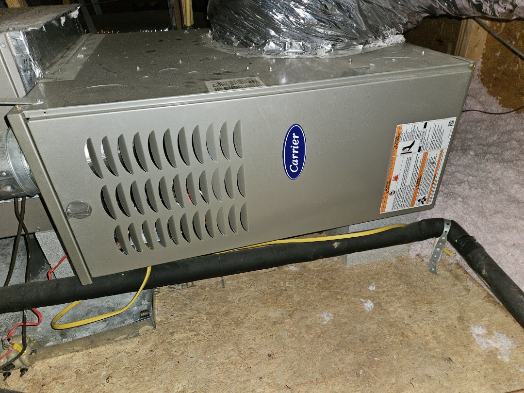 Service call. Performed maintenance on two Carrier gas furnaces. 