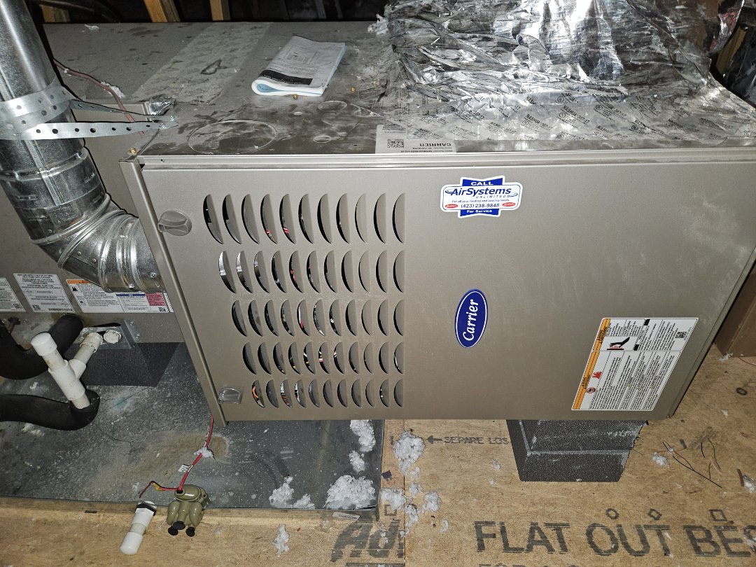 Service call. Performed maintenance on two Carrier gas furnaces. 