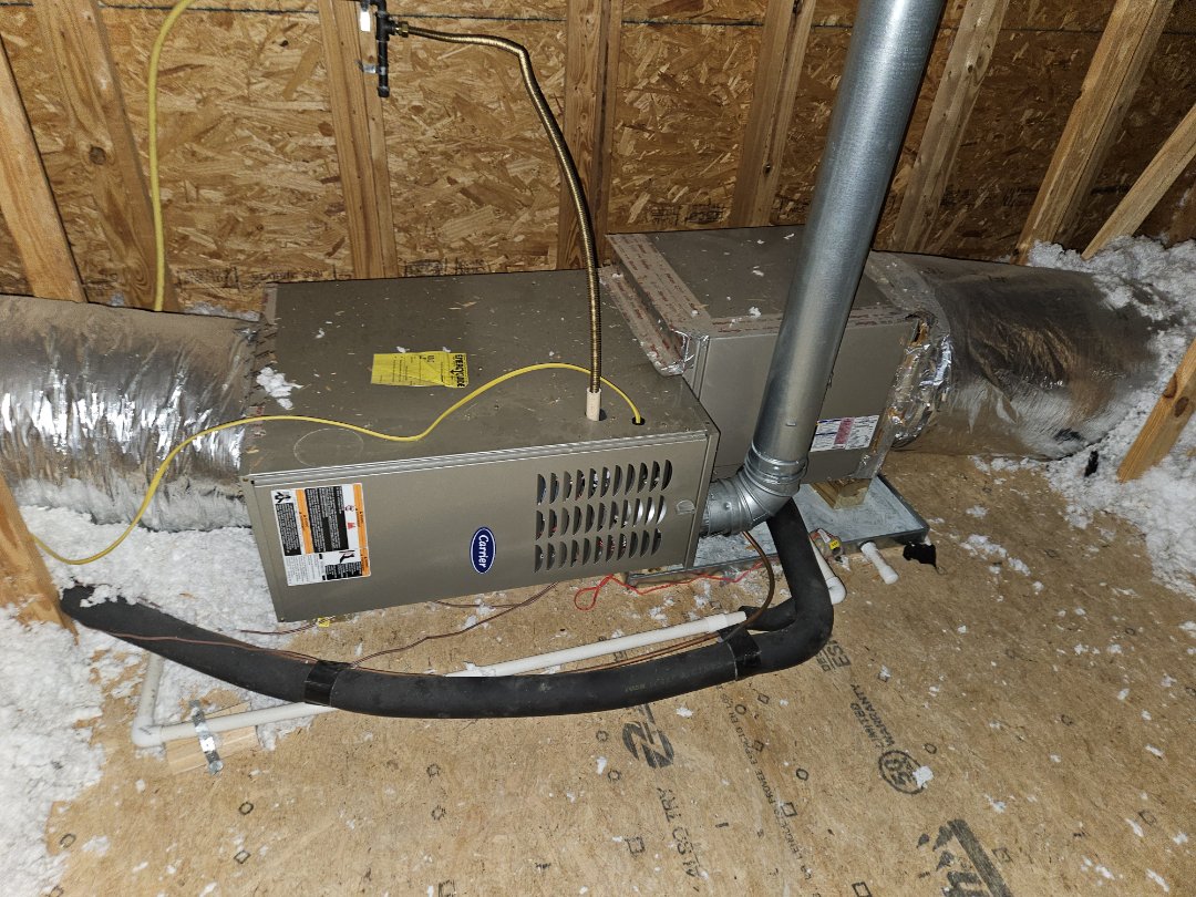 Service call. Performed maintenance on two Carrier gas furnace systems. 