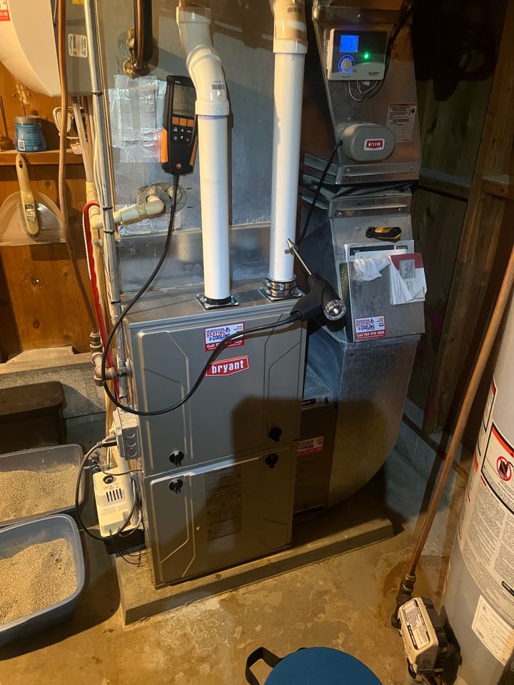 Performing fall maintenance on full Bryant system in spring lake Park, Minnesota