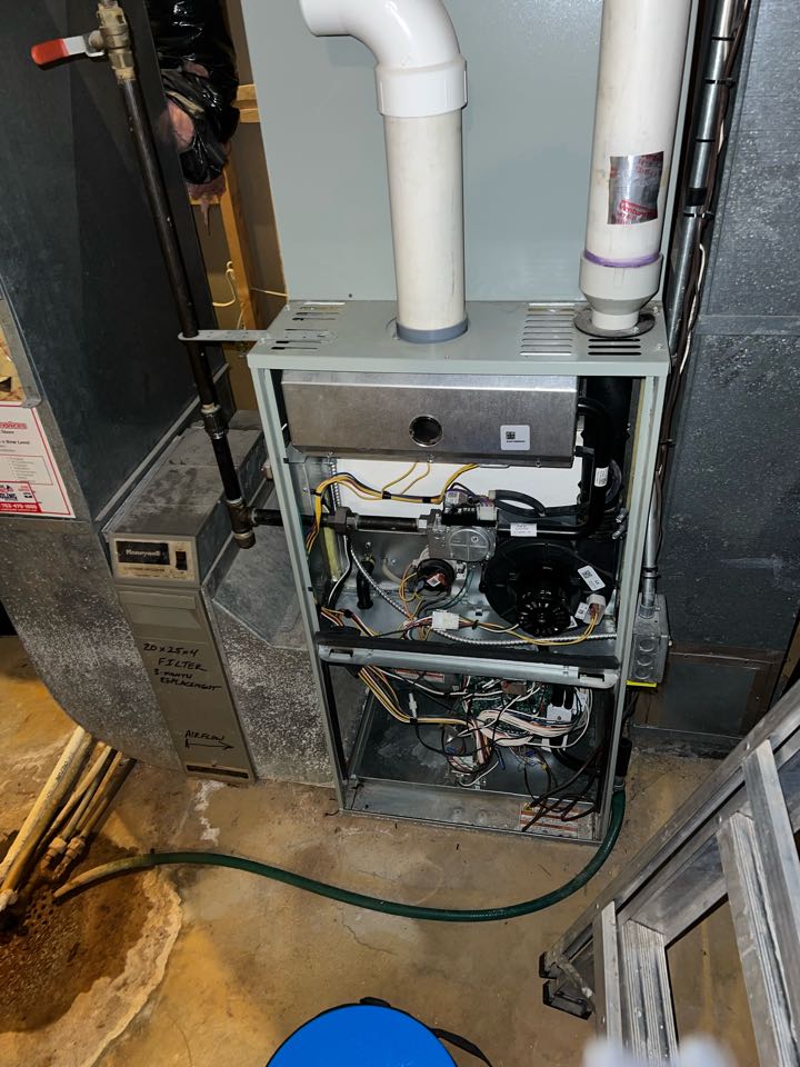 Preforming fall maintenance on furnace in Minnetrista, Minnesota 