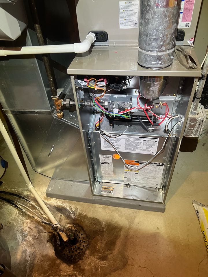 Performing furnace maintenance on Bryant system in Delano, MN