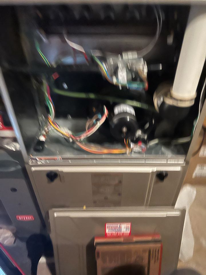 Performing fall furnace maintenance on Bryant system in Long Lake, MN