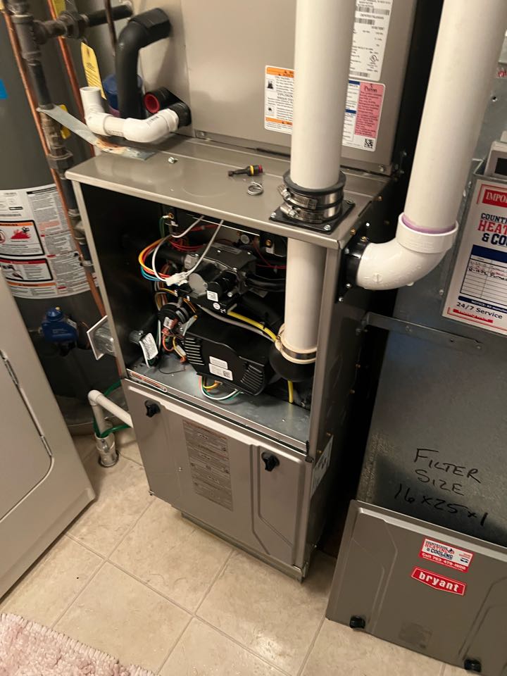 Performing fall furnace maintenance on Bryant system in Maple Grove, MN