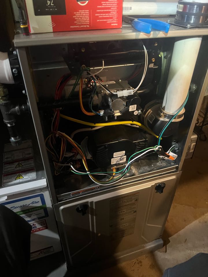 Performing fall furnace maintenance on Bryant system in Loretto, MN