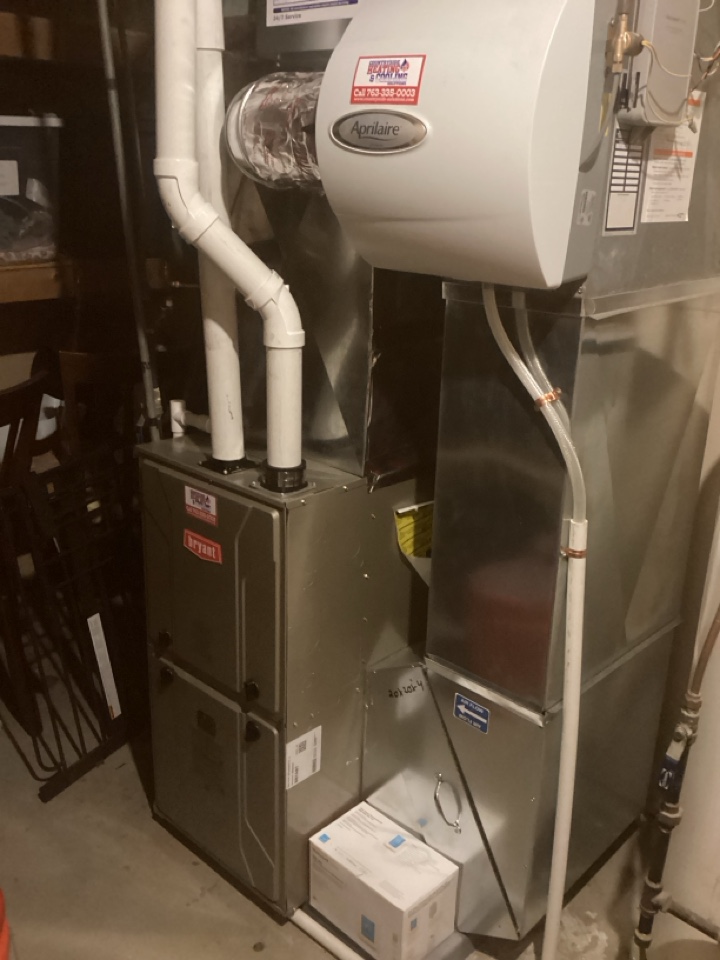 Furnace and heat pump installed in mound Mn