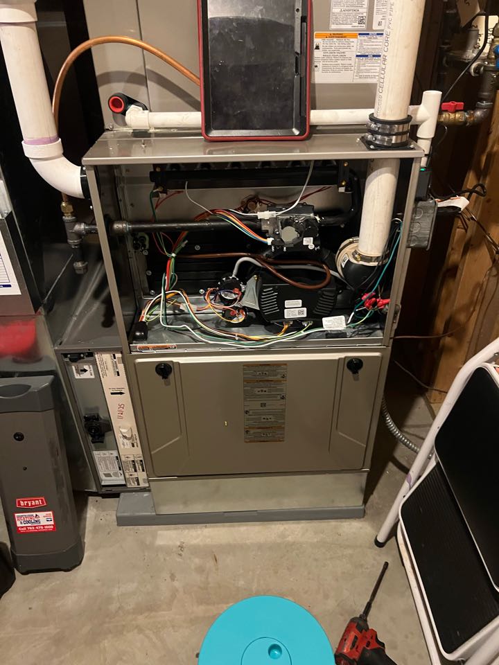 Performing fall furnace maintenance on Bryant system in Orono, Minnesota.