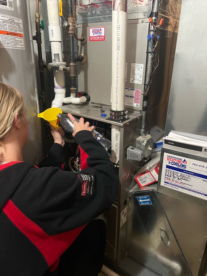 Performing fall furnace maintenance on Bryant system in Wayzata, MN