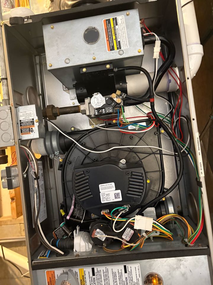Performing fall furnace and humidifier maintenance- Mound MN