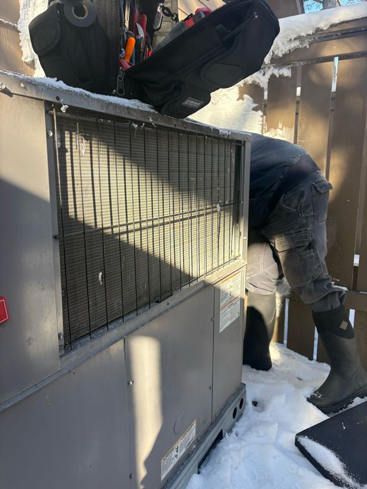 Performing package unit maintenance- Wayzata, MN.