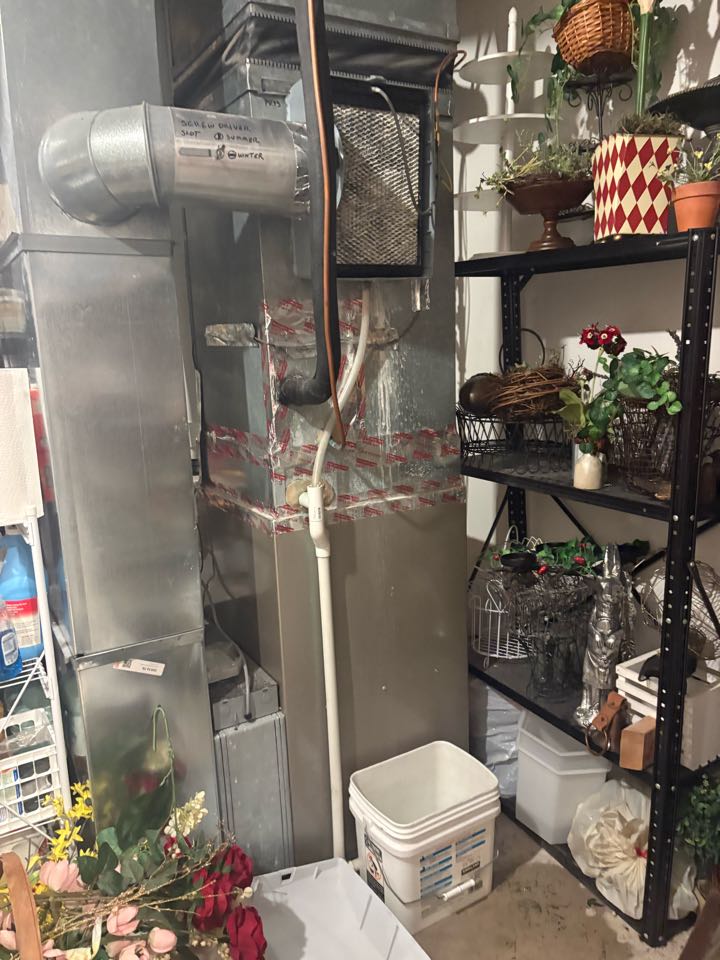 Performing service on a humidifier leak - Loretto, MN. 