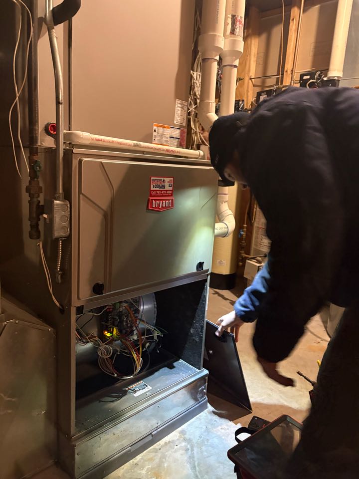 Performing service on a Bryant furnace- Maple Plain, MN.