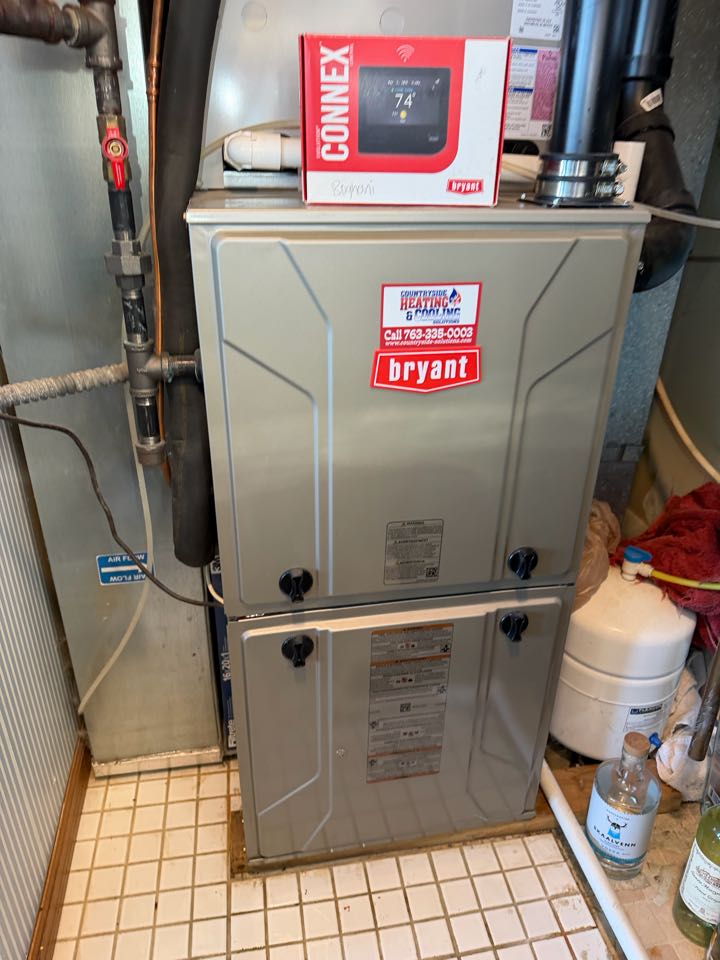 Performing furnace maintenance on Bryant system in Buffalo, MN