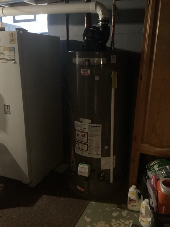 Tore out two 35gallon water heaters and relocated and installed new 75 gallon power vent water heater in Delano Mn