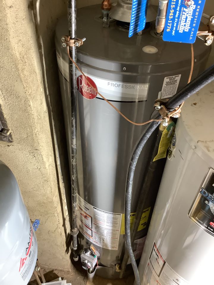 Successfully install a new water heater. Install one of two water heaters in a closet. PlumbPro Services. New Hope plumber.
