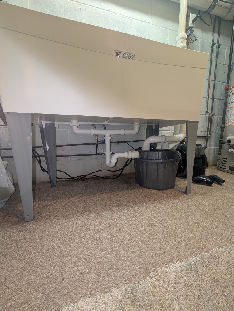 
new laundry pump. replace laundry pump. new laundry utility sink. utility sink faucet installation. PlumbPRO Services. Ambler, PA. Upper Dublin, PA. 