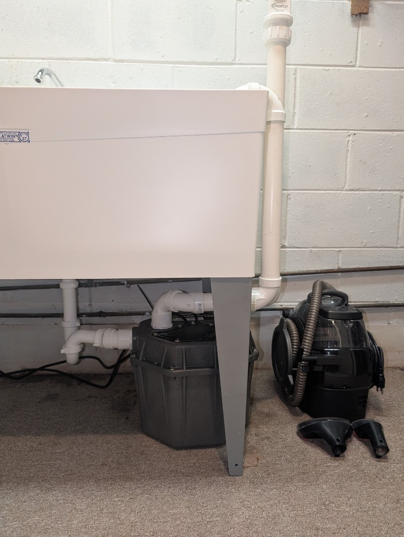 
new laundry pump. replace laundry pump. new laundry utility sink. utility sink faucet installation. PlumbPRO Services. Ambler, PA. Upper Dublin, PA. 