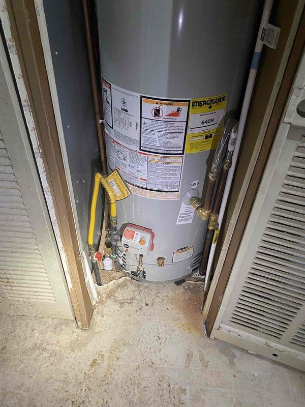 Successfully installed a Bradford White direct vent water heater, replacing the previous natural combustion unit. Completed all necessary plumbing connections including water supply lines, pressure relief valve, and gas line. Properly vented the system with metal ventilation piping according to code requirements.