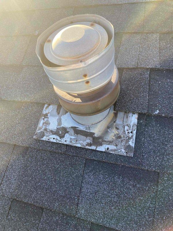 Responded to warranty callback for leak around furnace roof jack on mobile home. Inspected existing roof penetration and found damaged/deteriorated flashing with improper sealing. Replaced roof jack assembly with proper flashing and weathertight seal to prevent further water infiltration.