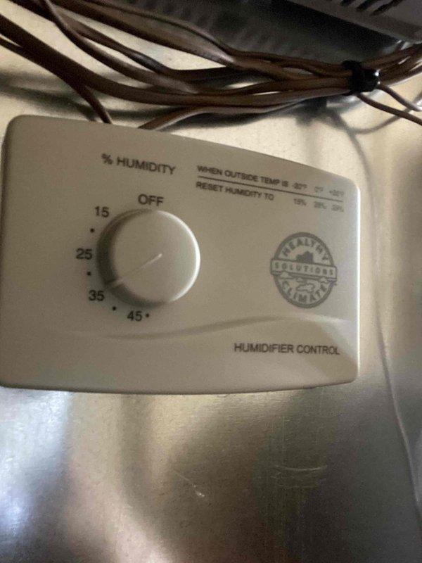 Investigated customer concern regarding rattling ductwork during humidifier operation. Installed new Healthy Climate humidifier on plenum, replacing all drain lines for humidifier, AC, and furnace with new PVC. Verified proper humidifier control settings and secured installation to eliminate noise issue.