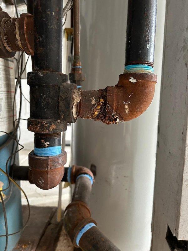 Responded to diagnostic service call for air conditioning system following a power outage to assess potential electrical damage. Performed comprehensive system evaluation including thermostat functionality testing, electrical component inspection, and refrigerant circuit analysis. Documented existing plumbing infrastructure in utility area showing significant corrosion on copper piping connections and evidence of moisture exposure. Presented thermostat replacement options to homeowner and provided detailed repair recommendations based on diagnostic findings.