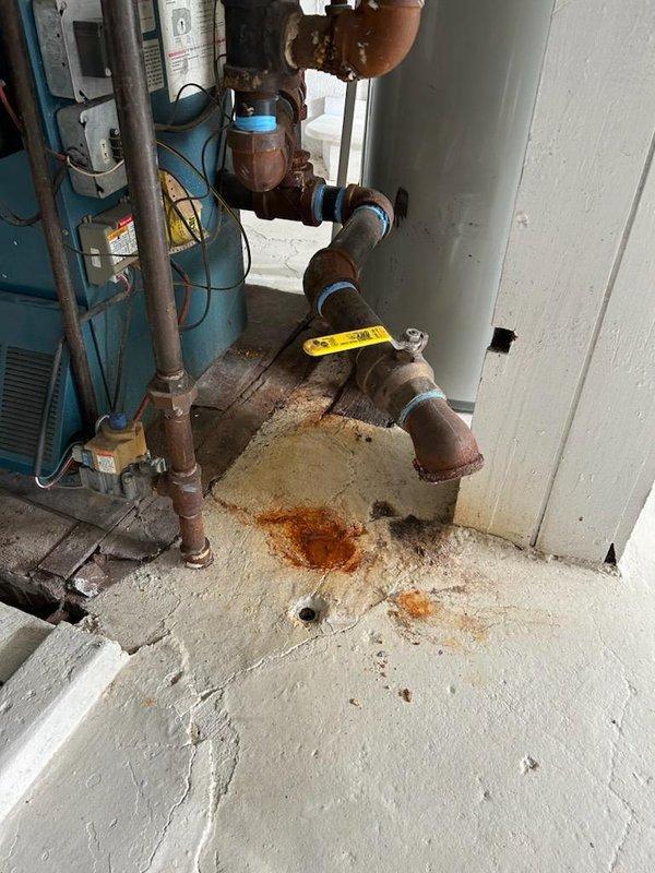 Responded to diagnostic service call for air conditioning system following a power outage to assess potential electrical damage. Performed comprehensive system evaluation including thermostat functionality testing, electrical component inspection, and refrigerant circuit analysis. Documented existing plumbing infrastructure in utility area showing significant corrosion on copper piping connections and evidence of moisture exposure. Presented thermostat replacement options to homeowner and provided detailed repair recommendations based on diagnostic findings.