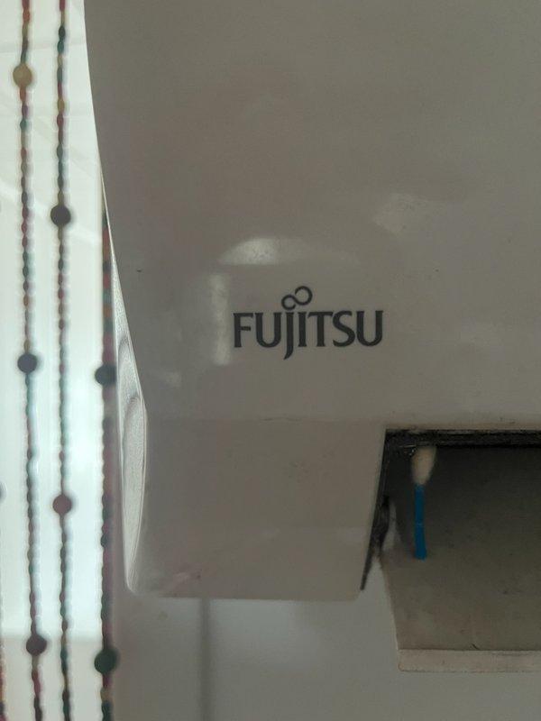 Responded to no-cooling complaint on Fujitsu inverter mini-split system with single indoor head unit located upstairs. Performed diagnostic evaluation of system, documented equipment information including model numbers and refrigerant line configuration. Advised homeowner to power down unit prior to arrival, collected photos of indoor unit installation and remote control displaying system settings, and provided repair quote for necessary corrections to restore proper operation.