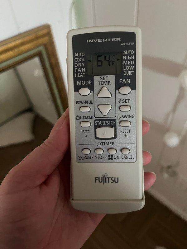 Responded to no-cooling complaint on Fujitsu inverter mini-split system with single indoor head unit located upstairs. Performed diagnostic evaluation of system, documented equipment information including model numbers and refrigerant line configuration. Advised homeowner to power down unit prior to arrival, collected photos of indoor unit installation and remote control displaying system settings, and provided repair quote for necessary corrections to restore proper operation.