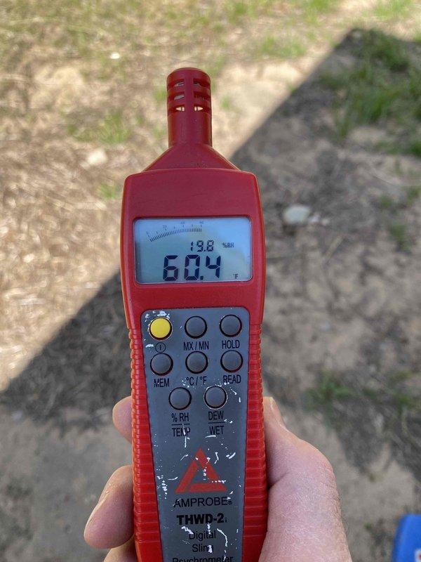 Performed diagnostic evaluation on HVAC system and identified refrigerant undercharge condition. Measured system pressures using refrigerant manifold gauge, recording 830 psig high-side and 16.96 psig low-side pressures with superheat at 2.1°F and subcooling at 13.3°F. Documented ambient conditions at 60.4°F and 13.8% relative humidity. Due to low outdoor temperatures (40-45°F), accurate refrigerant charge verification cannot be completed at this time, as temperature fluctuations affect pressure readings and system performance assessment. Return visit scheduled when ambient temperature reaches 70°F or above to properly test and adjust refrigerant charge to manufacturer specifications.