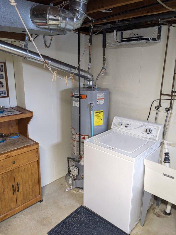 Completed Red Carpet Maintenance visit for VIP residential property. Performed comprehensive system inspection of HVAC equipment and State ProLine Commercial Grade water heater located in basement utility area. Replaced 16x25x5 MERV 11 air filter in air conditioning unit to maintain optimal air quality and system efficiency. Inspected water heater operation, verified proper venting connections, and confirmed all safety labels and specifications were visible and intact. Documented equipment conditions with photographic records showing water heater, ductwork, inline ventilation components, and surrounding utility area. All systems operating within normal parameters with no immediate service needs identified.