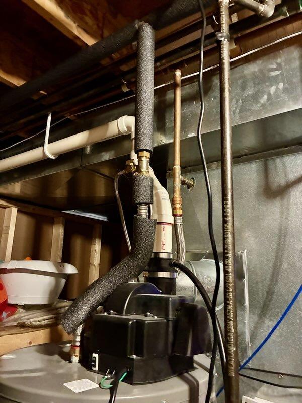 Responded to VIP Red Carpet Maintenance call for AC unit evaluation. Upon arrival, conducted comprehensive inspection of residential HVAC system located in basement utility area. Documented existing mechanical infrastructure including water heater, ductwork, insulated refrigerant lines, condensate pump assembly, and associated plumbing connections. Verified proper installation of foam-insulated copper piping, metallic ductwork routing, and condensate management system. Captured photographic documentation of all mechanical components, water heater specifications and safety labels, and overall system configuration for maintenance records. All equipment observed in operational condition with no immediate service concerns identified during visual inspection.