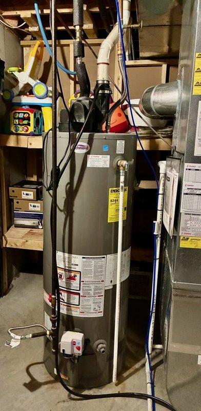 Responded to VIP Red Carpet Maintenance call for AC unit evaluation. Upon arrival, conducted comprehensive inspection of residential HVAC system located in basement utility area. Documented existing mechanical infrastructure including water heater, ductwork, insulated refrigerant lines, condensate pump assembly, and associated plumbing connections. Verified proper installation of foam-insulated copper piping, metallic ductwork routing, and condensate management system. Captured photographic documentation of all mechanical components, water heater specifications and safety labels, and overall system configuration for maintenance records. All equipment observed in operational condition with no immediate service concerns identified during visual inspection.