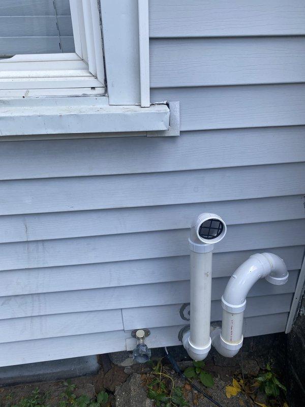 Completed inspection corrections on 90% efficiency furnace and air conditioning installation. Relocated furnace vent termination to proper clearance distance from window and properly bonded all PVC connections with primer and glue. Replaced severely kinked refrigerant suction line and secured sealtite connector into condenser knockout with proper washers and fittings.
